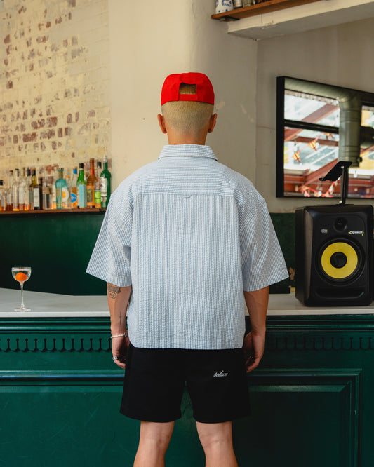 Striped Seersucker Half Zip Polo - Sky Blue/Rose Red