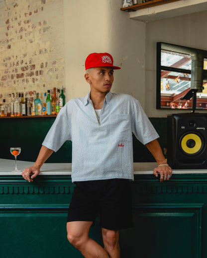 Striped Seersucker Half Zip Polo - Sky Blue/Rose Red