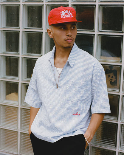 Striped Seersucker Half Zip Polo - Sky Blue/Rose Red